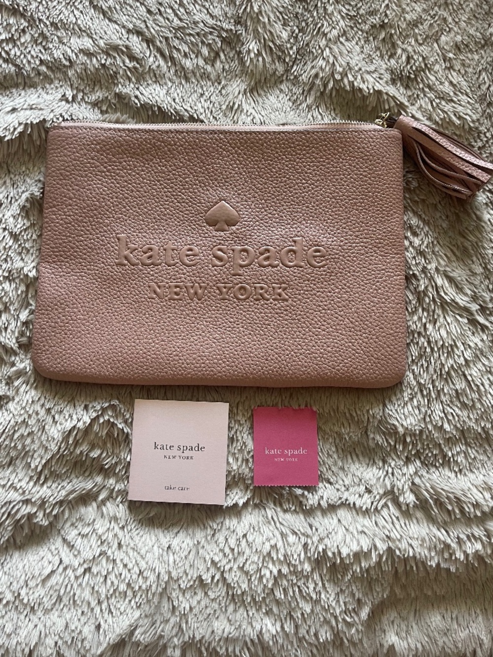 Kate Spade Pink Pebble leather clutch
